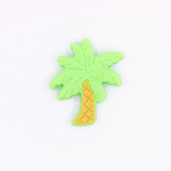 top view of a pile of Palm Tree Silicone Focal Bead Accessory