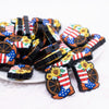front view of a pile of Patriotic Boots Silicone Focal Bead Accessory