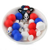 front view of a pile of Patriotic Cow Silicone Variety Bead Pack- 27 Pieces