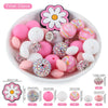 detailed view of a pile of Pink Floral Silicone Variety Bead Pack- 33 Pieces