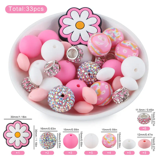 detailed view of a pile of Pink Floral Silicone Variety Bead Pack- 33 Pieces