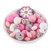 front view of a pile of Pink Floral Silicone Variety Bead Pack- 33 Pieces