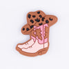 top view of a pile of Pink Cowgirl Boot Silicone Focal Bead Accessory