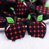 close up view of a pile of Plaid Apple Silicone Focal Bead Accessory
