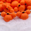 close up view of a pile of Pumpkin Mouse 3D Focal Bead Accessory