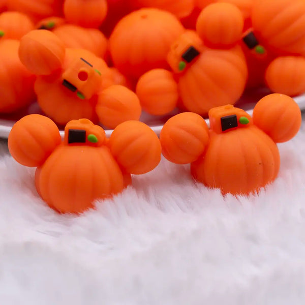 close up view of a pile of Pumpkin Mouse 3D Focal Bead Accessory