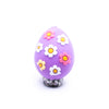 top view of a pile of 3D Purple Egg with Flowers Silicone Focal Bead Accessory