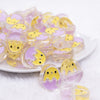 front view of a pile of 26mm Purple Easter Egg with Chick acrylic bead