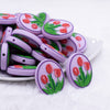 close up view of a pile of Oval Flower Silicone Focal Bead Accessory