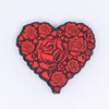 top view of a pile of Red Roses Heart Silicone Focal Bead Accessory