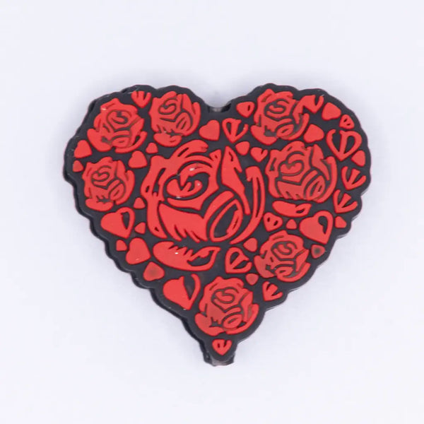 top view of a pile of Red Roses Heart Silicone Focal Bead Accessory