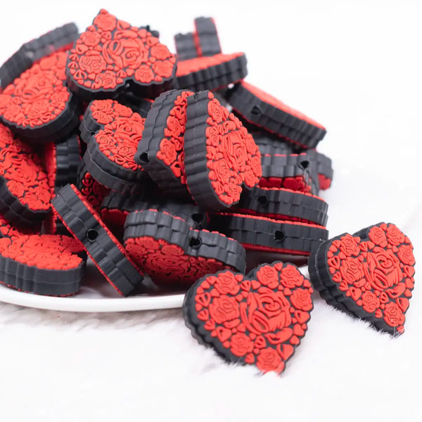 front view of a pile of Red Roses Heart Silicone Focal Bead Accessory