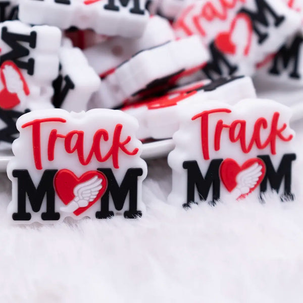 close up view of a pile of Track Mom Silicone Focal Bead Accessory