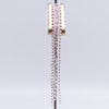 side view of a pile of 24mm Triangle Mother of Pearl with hanging Rhinestones bead