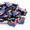front view of a pile of Patriotic Hearts with Leopard print Silicone Focal Bead Accessory