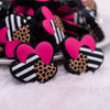 macro view of a pile of Triple hearts with leopard print Silicone Focal Bead Accessory