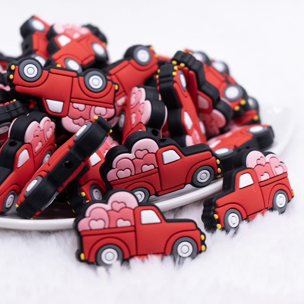close up view of a pile of Valentine Truck Silicone Focal Bead Accessory
