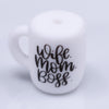 macro view of a pile of Wife Boss Coffee Cup Silicone Focal Bead Accessory