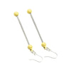 top view of a pile of yellow Beadable Earring Bars