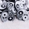 close up view of a Yin Yan Skull Silicone Focal Bead Accessory