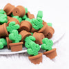 front view of a pile of Cactus flower pot Silicone Focal Bead Accessory