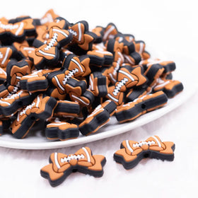 Football Bow silicone focal bead