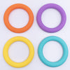 top view of a pile of 65mm Round Ring Silicone Focal Beads Accessory