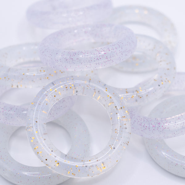 front view of a pile of 40.5mm Round Ring Silicone Focal Beads Accessory