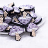 front view of a pile of Purple Mushroom Silicone Focal Bead Accessory