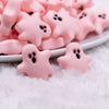 front view of a pile of Pink Ghost Silicone Focal Bead Accessory