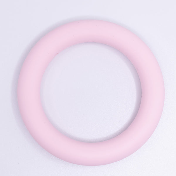 view of a pink of 65mm Round Ring Silicone Focal Beads Accessory