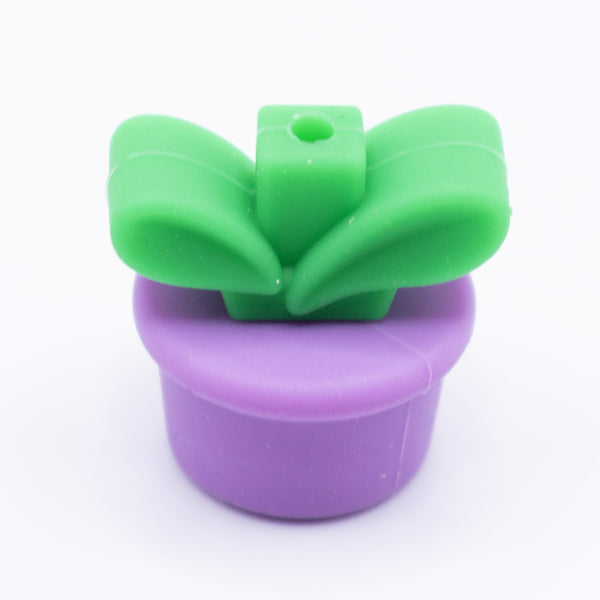 front view of a purple Flower Pot Silicone Focal Beads Accessory