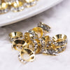 Macro view of a pile of 10mm Gold Rondelle Large Hole Spacer Beads [Set of 20]