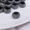 macro view of a pile of 12mm Black Resin with Silver Rhinestone Rondelle Spacer Beads - Set of 10