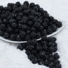 Front view of a pile of 12mm Black Rhinestone Bubblegum Beads [10 & 20 Count] 