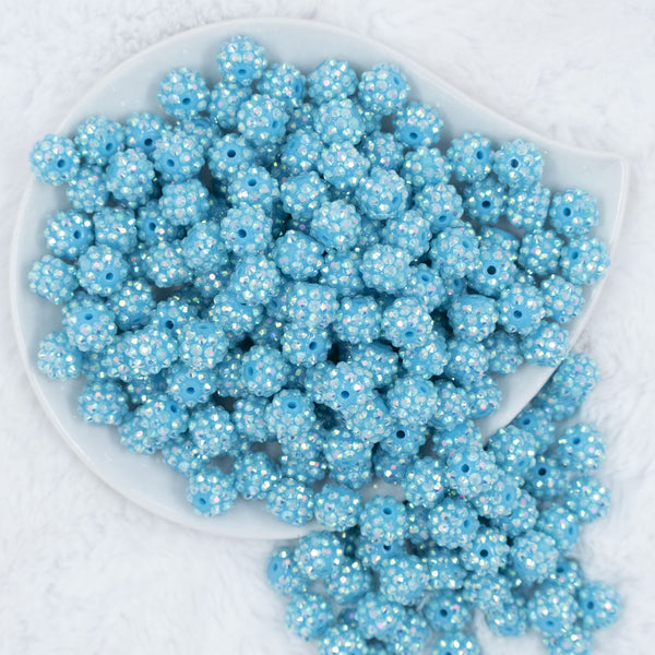 Top view of a pile of 12mm Blue Dazzle Rhinestone AB Bubblegum Beads [10 & 20 Count]