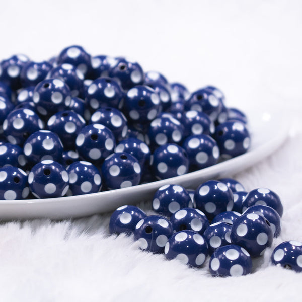 front view of a pile of 12mm Dark Blue with White Polka Dot Acrylic Chunky Bubblegum Beads