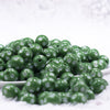 front view of a pile of 12mm Green with White Polka Dot Acrylic Chunky Bubblegum Beads