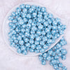 Top view of a pile of  12mm Ice Blue with White Polka Dot Acrylic Chunky Bubblegum Beads