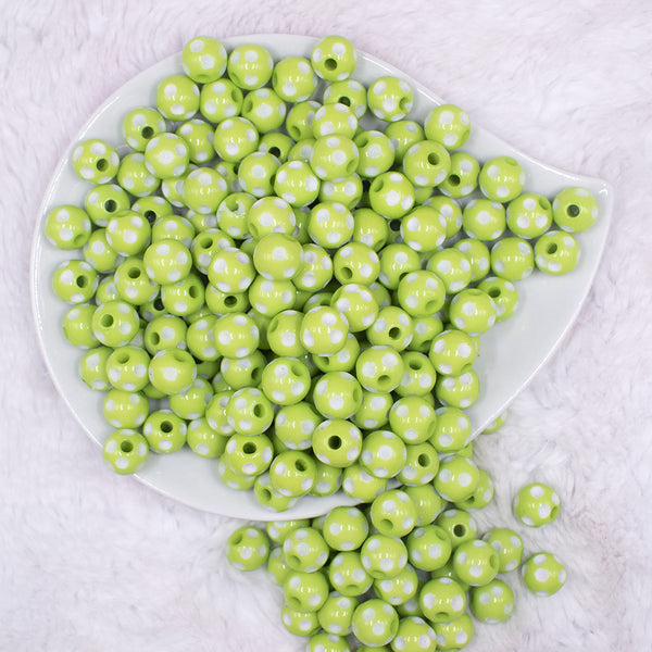 top view of a pile of 12mm Lime Green with White Polka Dot Acrylic Chunky Bubblegum Beads