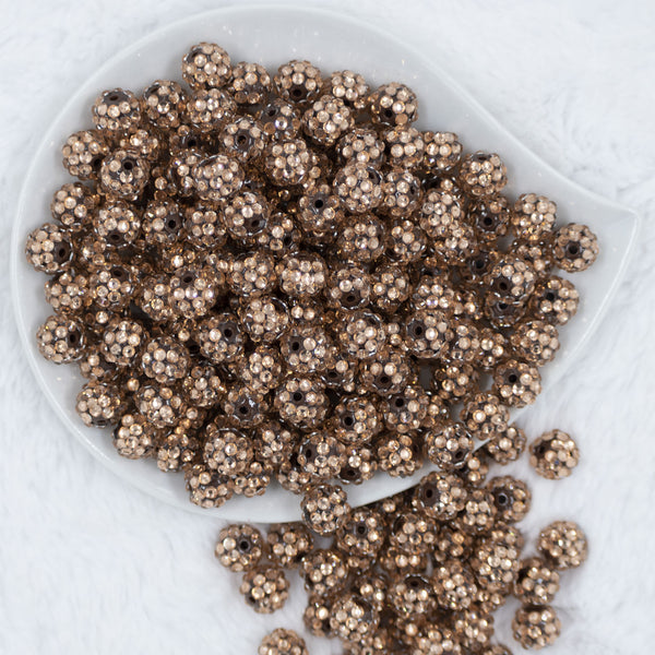 Top view of a pile of 12mm Rose Gold Rhinestone Bubblegum Beads [10 & 20 Count]
