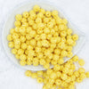Top view of a pile of 12mm Yellow Rhinestone AB Bubblegum Beads [10 & 20 Count]