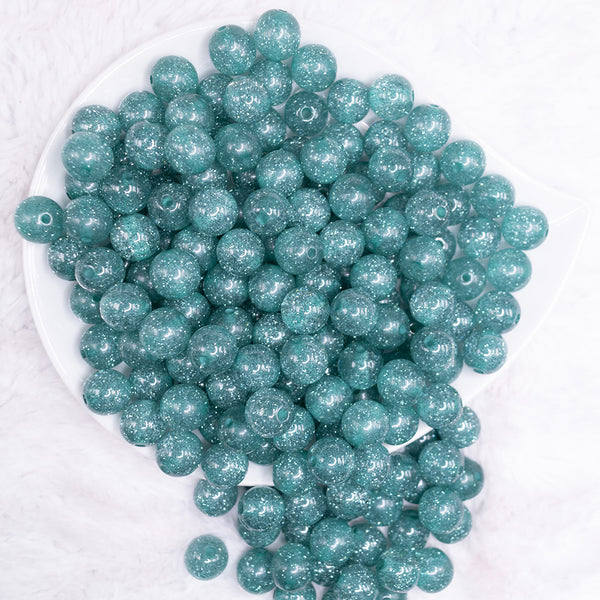 top view of a pile of 12mm Aqua Blue Shimmer Glitter Sparkle Bubblegum Beads - 20 Count
