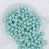 Top view of a pile of 12mm Aqua Blue Matte Acrylic Bubblegum Beads