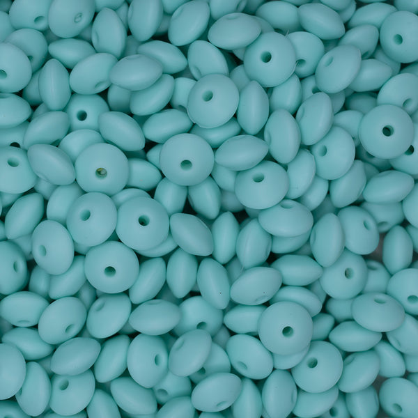 top view of a pile of 12mm Aqua Blue Lentil Silicone Bead