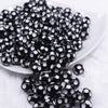 Front view of a pile of 12mm Black with White Polka Dot Acrylic Chunky Bubblegum Beads