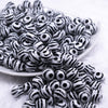 Front view of a pile of 12mm Black & White Zebra Print Chunky Acrylic Bubblegum Beads - 20 Count