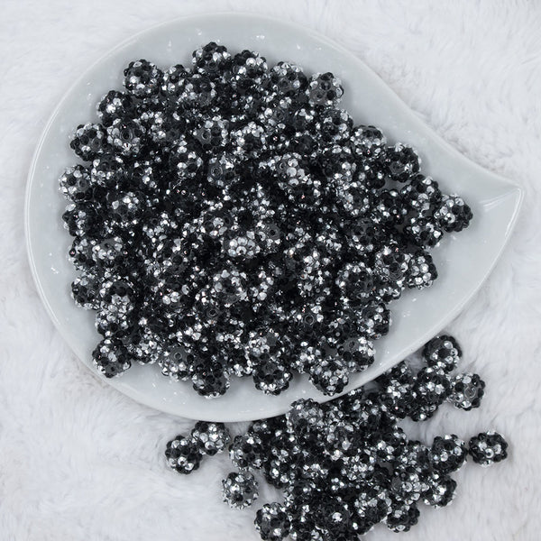 Top view of a pile of 12mm Black & Silver Confetti Rhinestone AB Bubblegum Beads - Choose Count