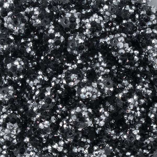 Close up view of a pile of 12mm Black & Silver Confetti Rhinestone AB Bubblegum Beads - Choose Count