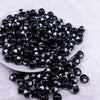 Front view of a pile of 12mm Black with White Heart Chunky Acrylic Bubblegum Beads [20 Count]